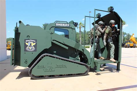 armoured skid steer|armored swat vehicle.